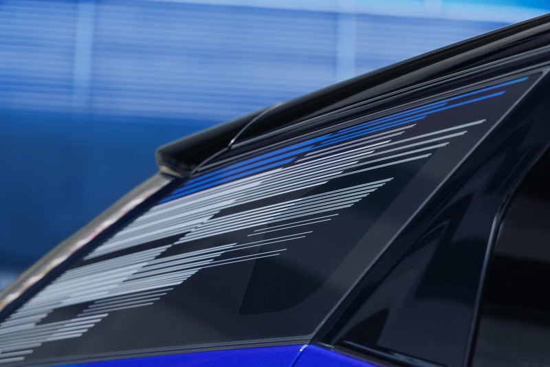 Close-up of the Modern Pattern on the 2026 OPTIQ-V Rear Quarter Glass | Mildenberger Motors in Hamilton Montana MT