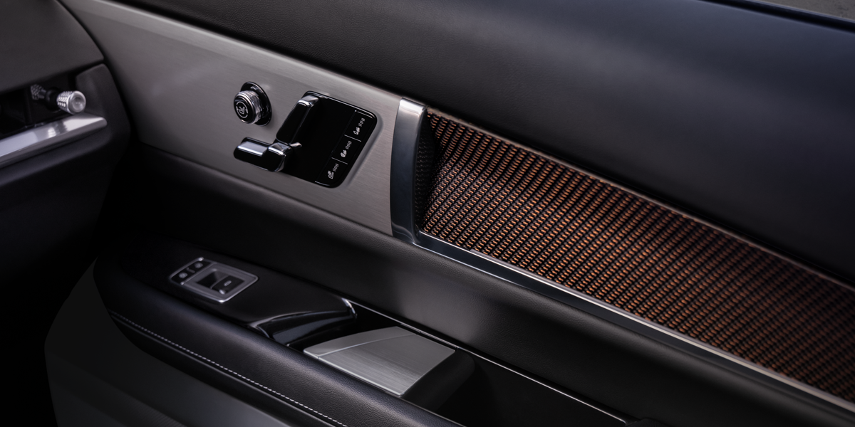 Close-up of the 2027 VISTIQ AKG Door Speaker and Seat Controls